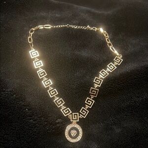 Elegant Gold Necklace with Heart Pendant